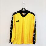 Koszulka piłkarska Puma Torceira template w kolorze żółto-czarnym marki Puma.