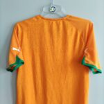 Koszulka domowa Wybrzeże Kości Słoniowej 2010-11 w kolorze pomarańczowym w rozmiarze M