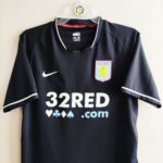 Trzecia koszulka piłkarska klubu Aston Villa z sezonu 2007-08 w kolorze czarnym marki Nike.