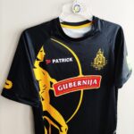 Wyjazdowa koszulka piłkarska klubu FK Šiauliai w kolorze czarnym marki Patrick.