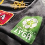 Wyjazdowa koszulka piłkarska klubu FK Šiauliai w kolorze czarnym marki Patrick.