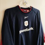 Bluza treningowa klubu Crew Alexandra z sezonu 2001-03 w kolorze granatowym firmy Rebook.