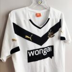 Specjalna koszulka piłkarska klubu Newcastle United z sezonu 2014-15 w kolorze białym firmy Puma.