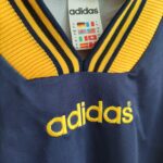 Koszulka piłkarska Adidas template long sleeve z lat 1996-1997 w kolorze granatowo-żółtym.