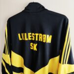 Bluza treningowa Lillestrøm SK 1995-97 w kolorze czarno-żóltym marki Adidas.