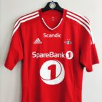 Trzecia koszulka piłkarska Rosenborg BK z sezonu 2016 w kolorze czerwonym marki Adidas.