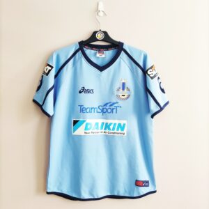 Domowa koszulka piłkarska Sliema Wanderers z lat 2004-06 w kolorze niebieskim marki Asics.