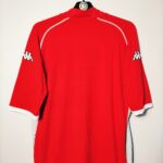 Domowa koszulka reprezentacji Walii z sezonu 2002/03 w kolorze czerwonym marki Kappa.
