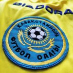 Wyjazdowa koszulka reprezentacji Kazachstan 2006-07 w kolorze żółtym marki Diadora.