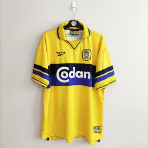 Domowa koszulka Brøndby IF z lat 1998-00 w kolorze żółto-niebieskim marki Reebok.