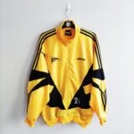 Bluza treningowa IK Start player issue z lat 1996-97 w kolorze żółto-czarnym marki Adidas.