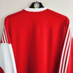 Domowa koszulka Middlesbrough z sezonu 2009-10 w kolorze czerwono-białym marki Adidas.