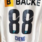 Wyjazdowa koszulka Stabaek IF (#88 C. Cheng) match issue z sezonu 2020 w kolorze białym marki Macron.