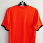Domowa koszulka Holandia z lat 2012-13 w kolorze pomarańczowym marki Nike.